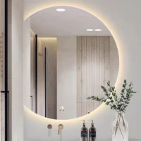 Luxury Organic Circle Backlit 4/6 Moon Wall Mirror: circular bathroom mirror with a flat right side and warm LED halo backlighting.