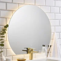 Luxury Organic Circle Backlit 4/6 Moon Wall Mirror: circular mirror with a flat base and a cool-toned LED backlit glow.