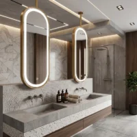 Modern bathroom with twin oval backlit mirrors above a double concrete sink and wooden vanity, marble walls, and a glass shower.