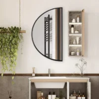 Black-framed Half Moon mirror without backlight, mounted on a white wall beside a shelving unit and above a wooden vanity.