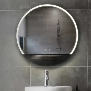 LED Half Moon Round Black Frame Mirror with glowing ring light above a modern sink, reflecting tiled shower wall in a sleek bathroom setting