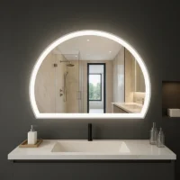 White Edge Half Moon Bathroom Vanity Mirror with LED glow above modern sink, reflecting a sleek shower and minimalist bathroom interior