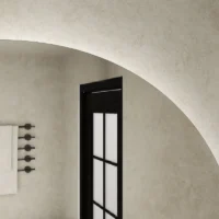 Classic Round LED 4/6 Moon Mirror with soft halo backlight, reflecting modern bathroom wall and black framed glass door