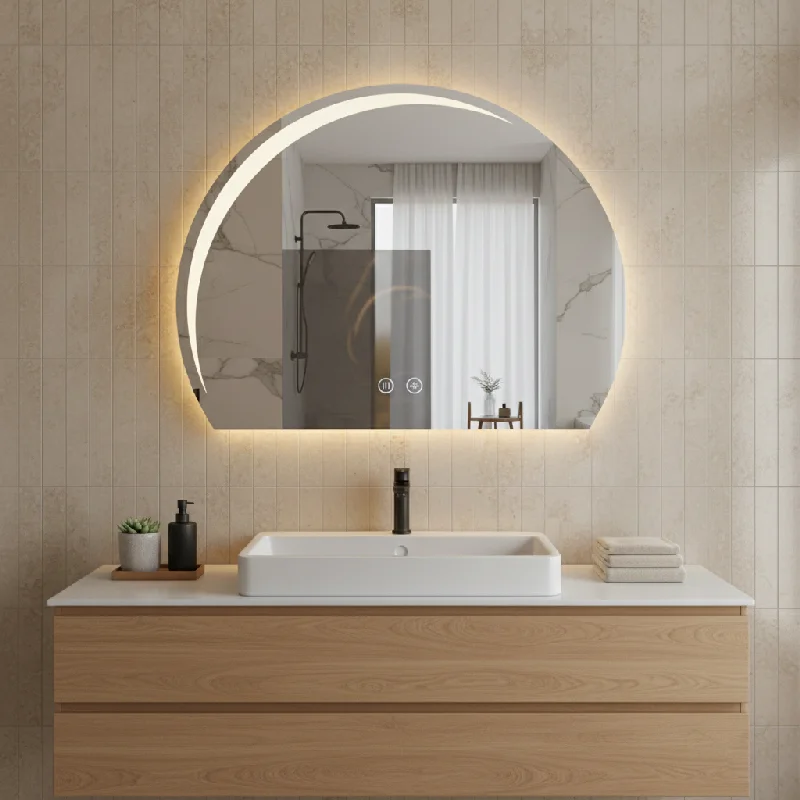 Luxury Half LED Moon Circle Mirror with warm backlit glow above modern vanity, wood cabinet, and vessel sink in a stylish bathroom.