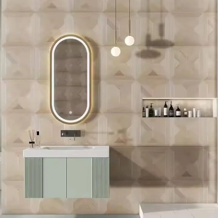 Modern bathroom with an oval backlit mirror above a mint green vanity and a shelf of toiletries.
